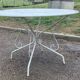 Ensemble salon de jardin en fer forgé avec 4 chaises
