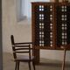 Pair of Scandinavian wooden armchairs with hand-carved folk motifs, 1920s.