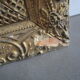 Old frame in wood and gilded stucco