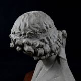 Terracotta bust of the smiling angel from Reims Cathedral with base