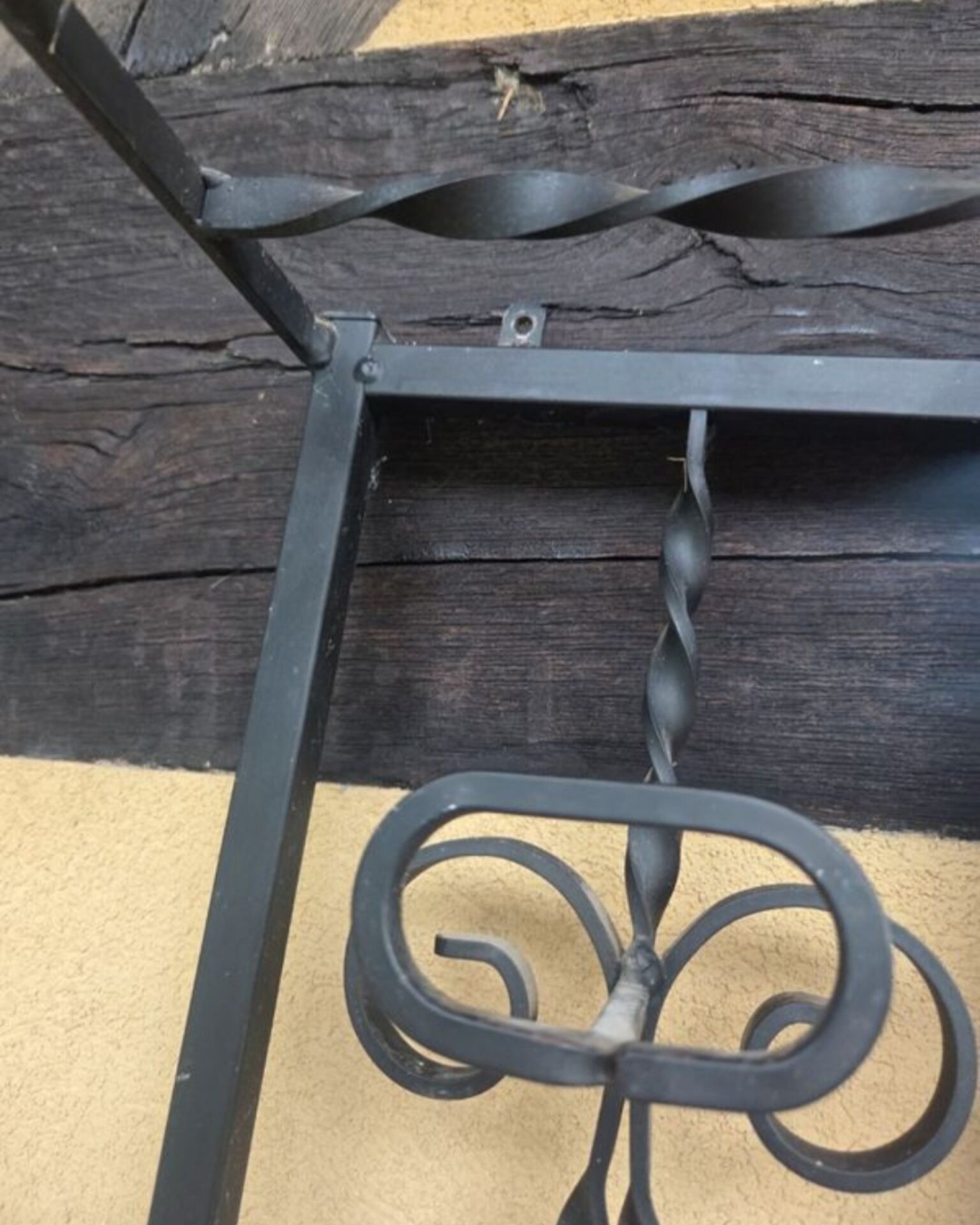 Large vintage wall coat rack in wrought iron with mirror and shelf.