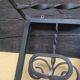 Large vintage wall coat rack in wrought iron with mirror and shelf.