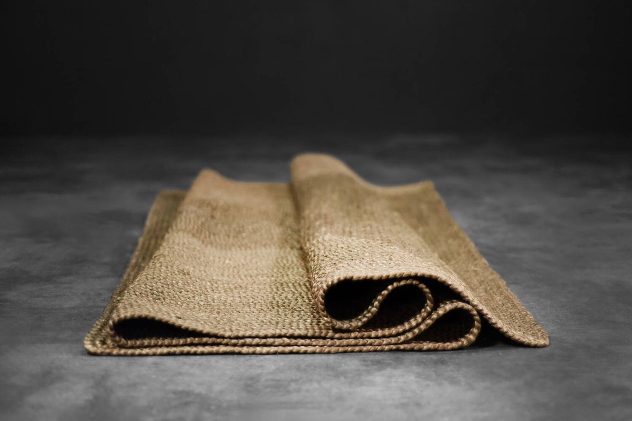 Brown flat-woven jute Indian rug, 1970.