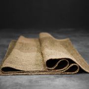 Brown flat-woven jute Indian rug, 1970.