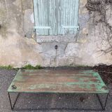 Pair of green teak coffee tables.