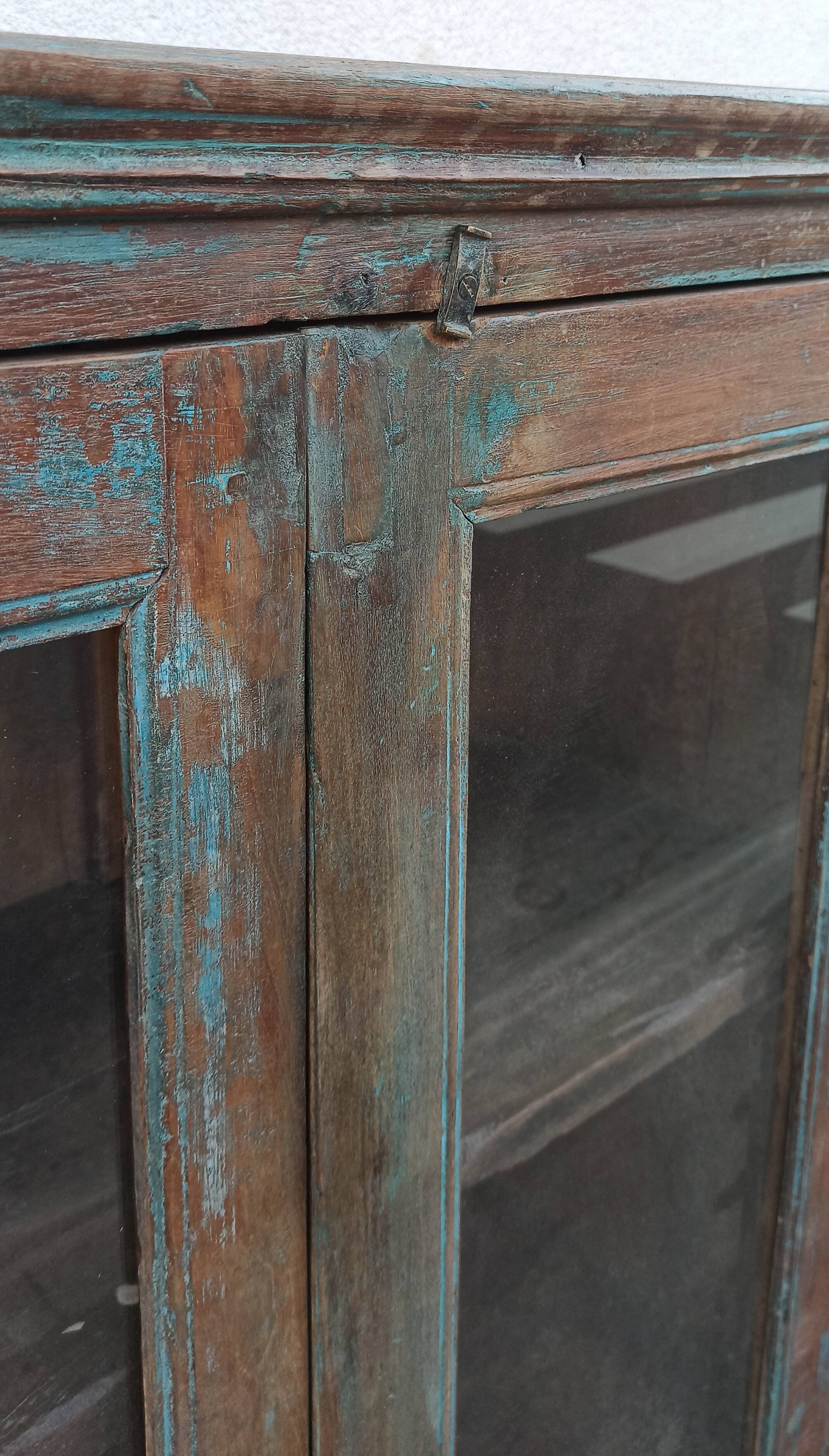 Old glazed wooden cabinet with beautiful patina