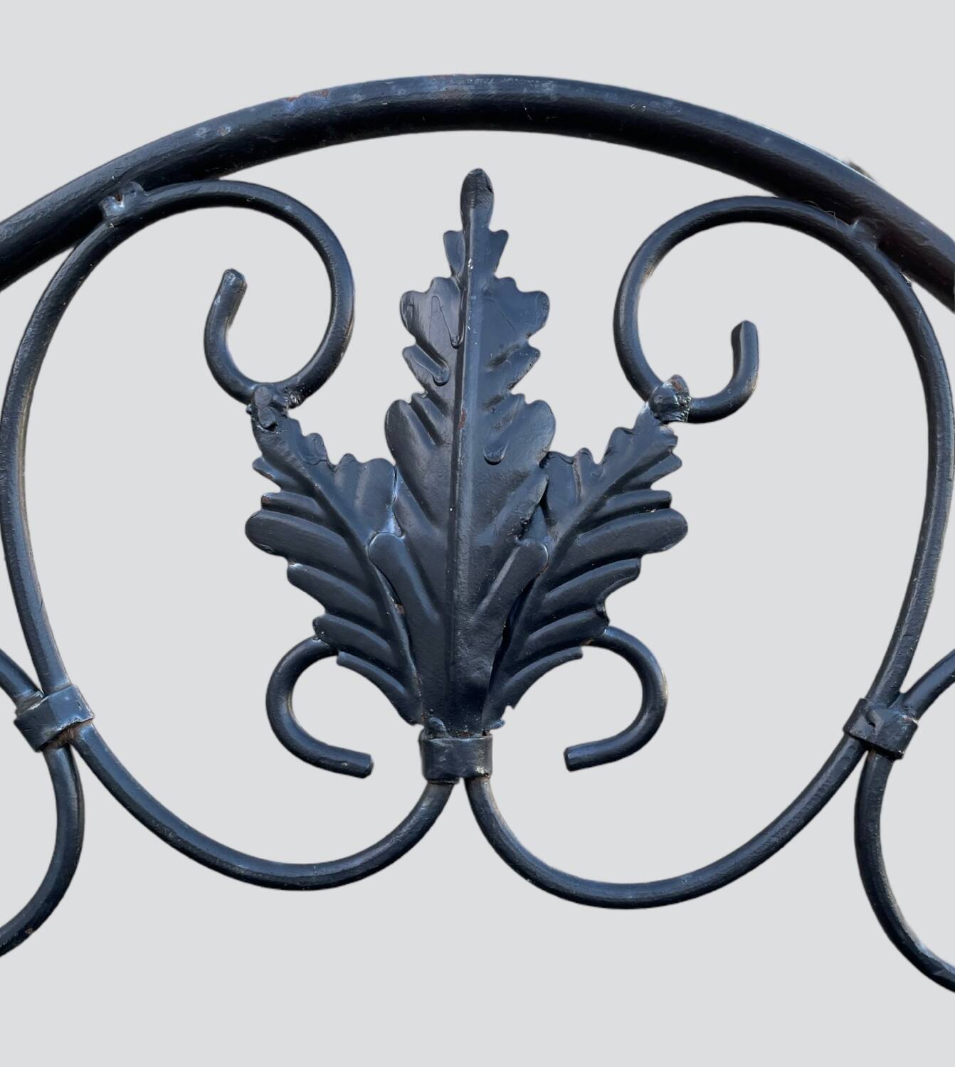 Old wrought iron garden shelf for plants