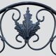 Old wrought iron garden shelf for plants