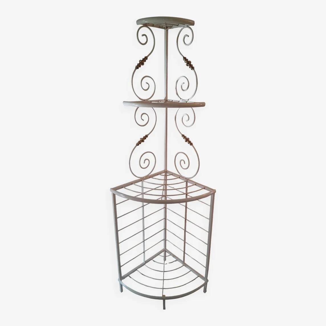 Cream and brass corner bakery shelf in wrought iron
