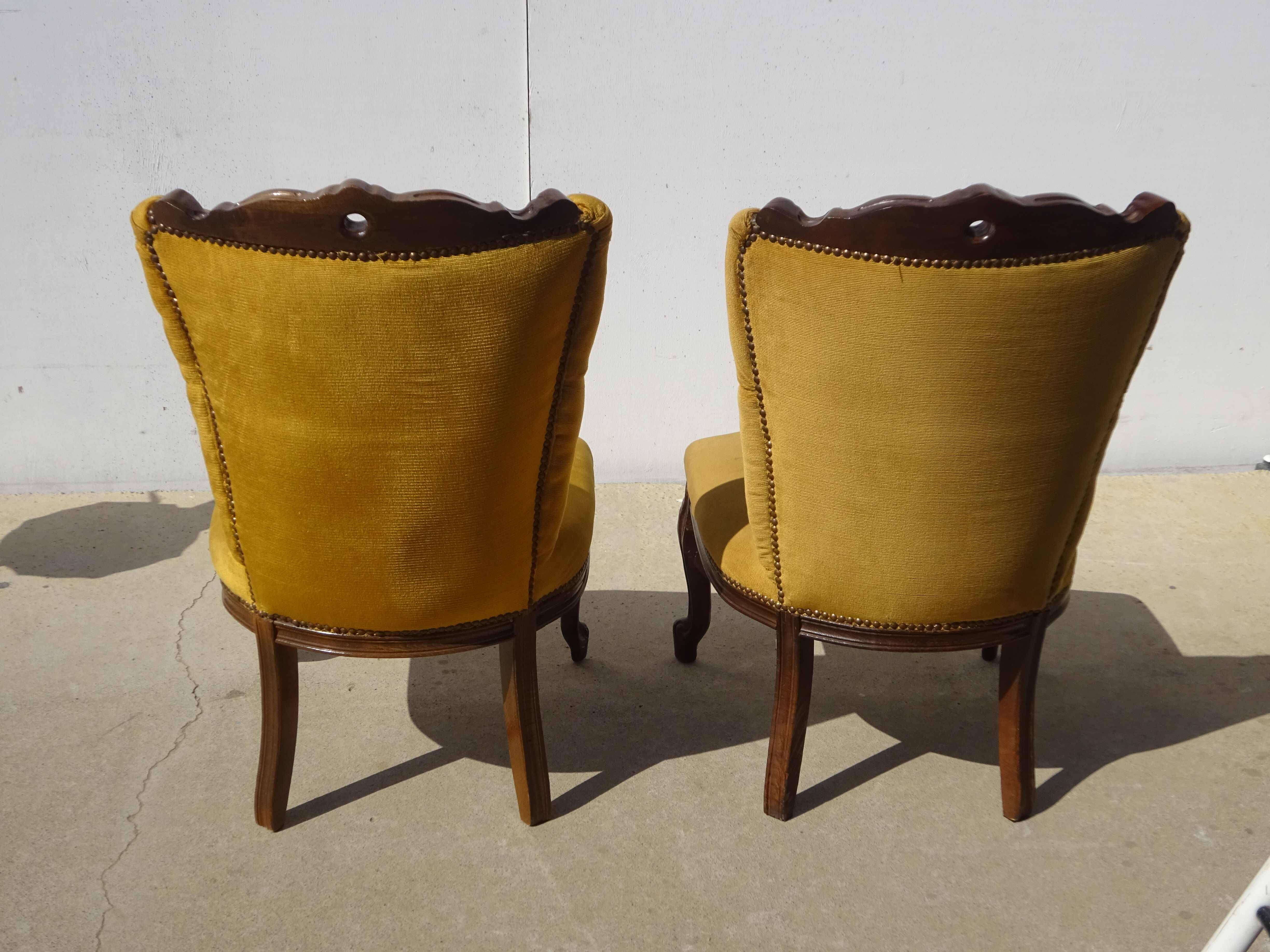 Golden yellow velvet armchairs