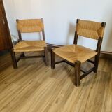 Pair of low wooden and straw armchairs