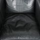 Fauteuil en cuir noir de style Art Déco en bon état.