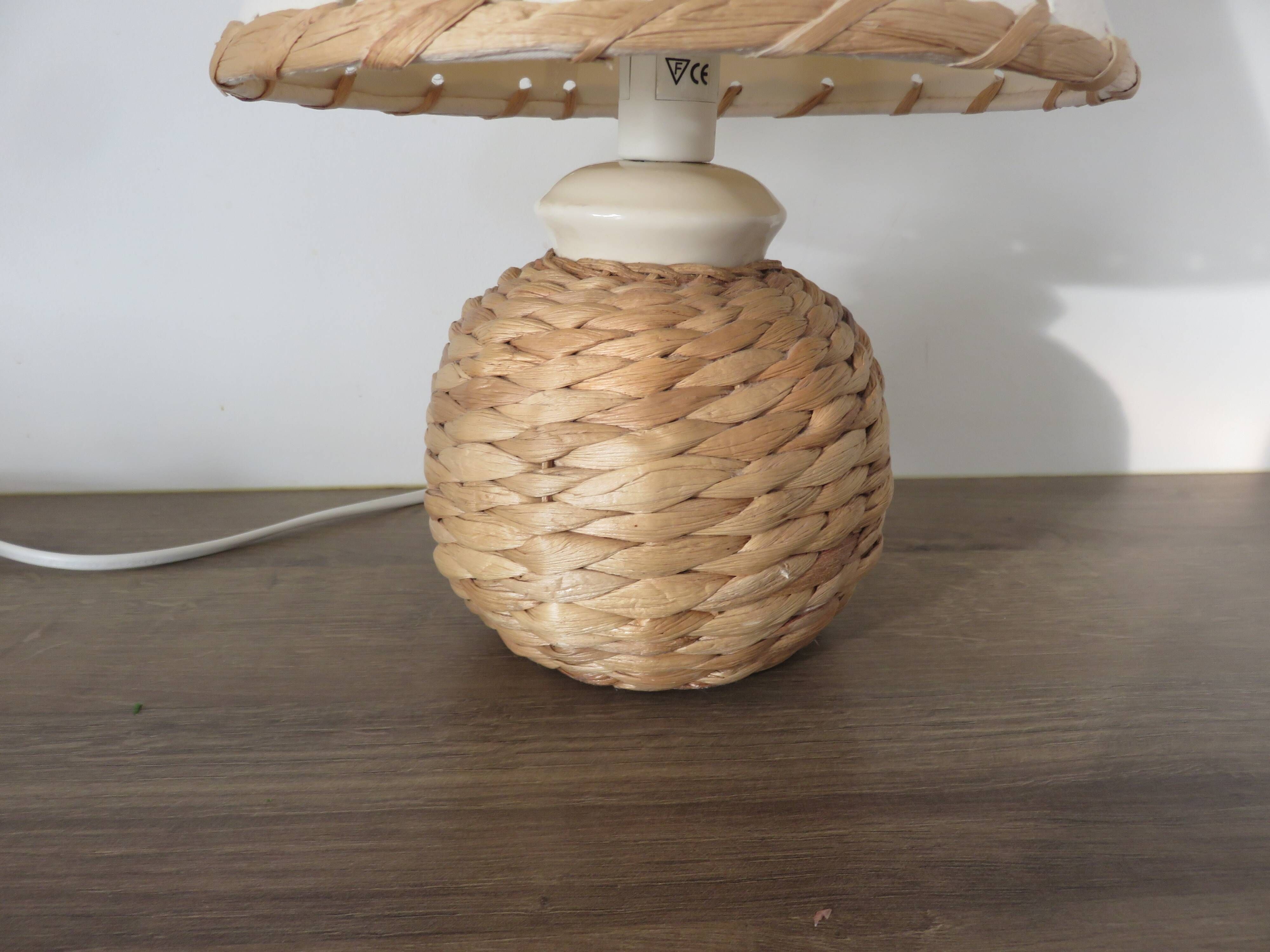 Pair of bedside lamps made of woven sea rush, matching lampshades, 1980.
