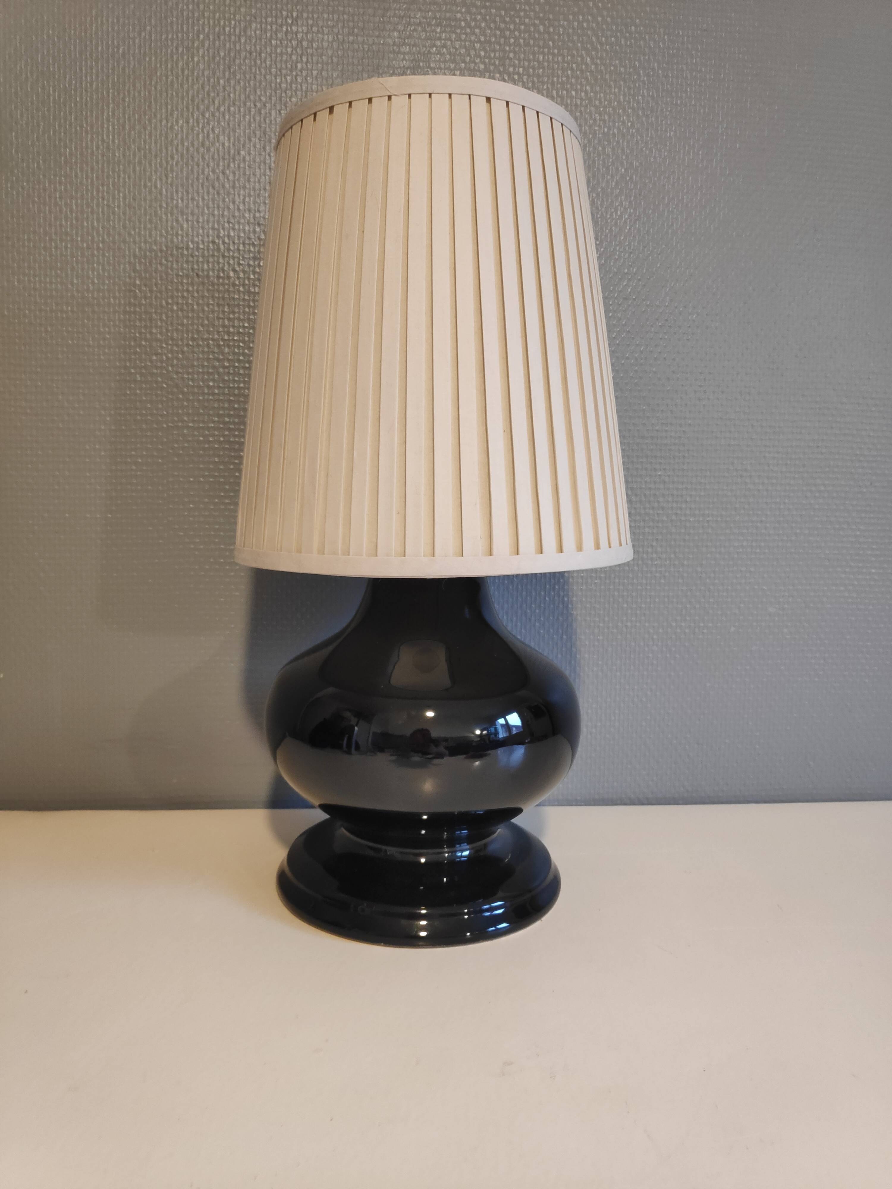 Black ceramic foot lamp and beige fabric lampshade