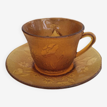 6 amber-colored glass cups and saucers