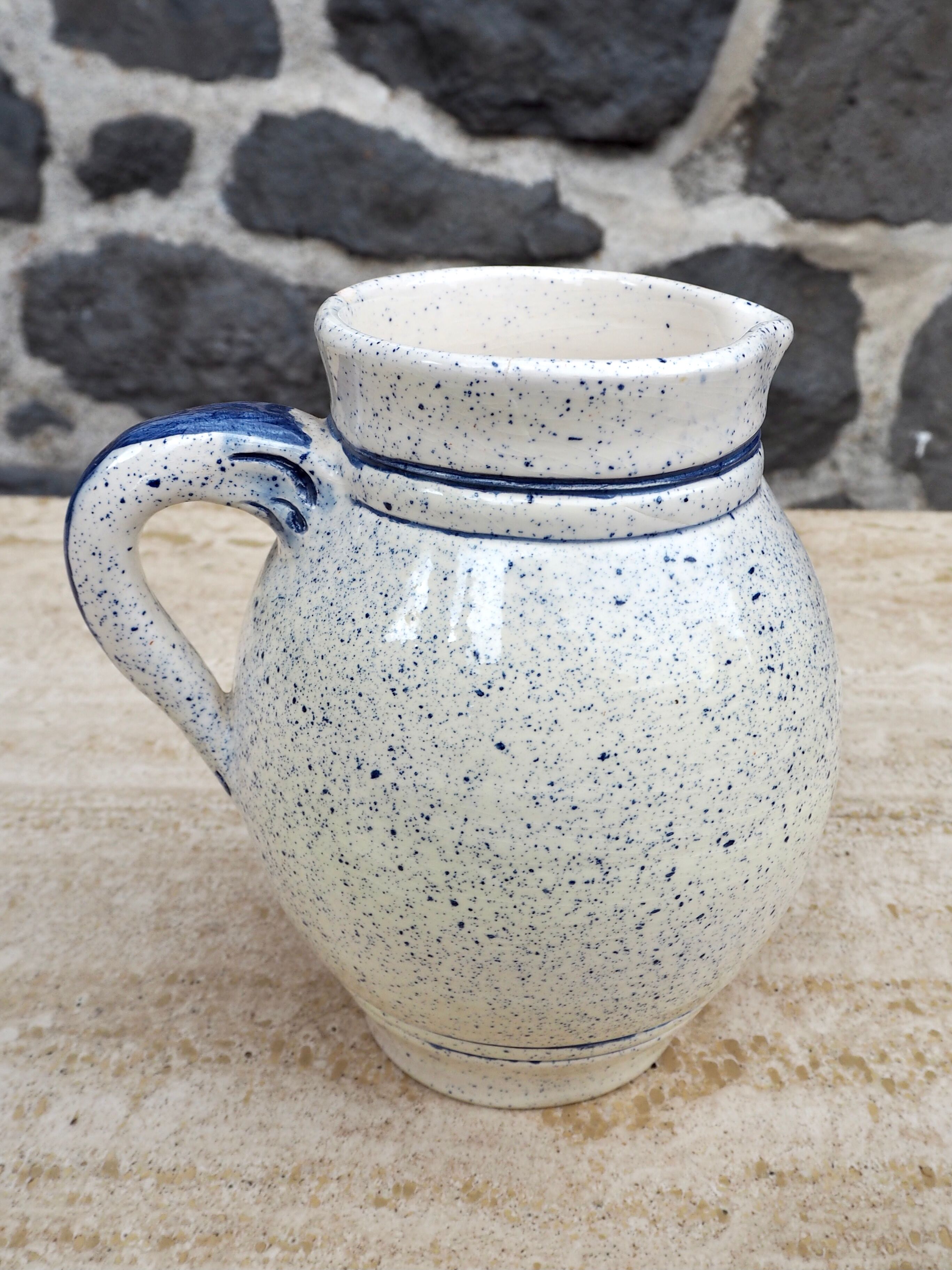 Speckled ceramic pitcher