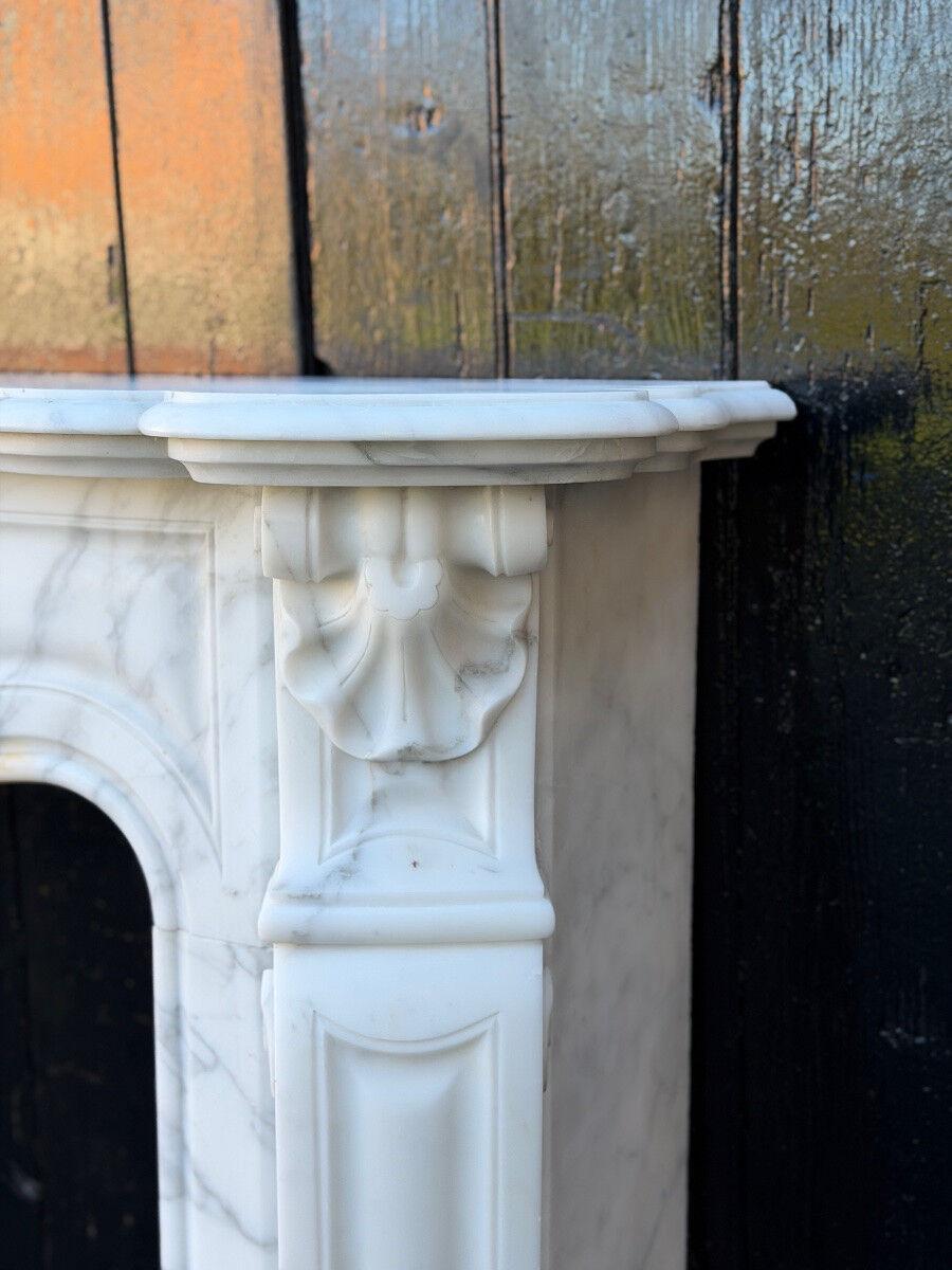 Louis XV style fireplace in Carrara marble, around 1900.