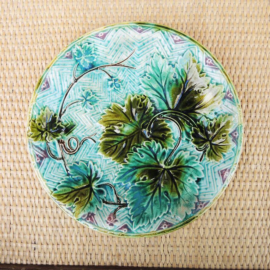 Old slipware plate: vine leaves