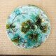 Old slipware plate: vine leaves