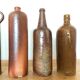 Set of 5 antique glazed stoneware bottles