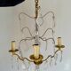 Chandelier set & 4 wall lights with pendants, Louis XV style, gilded metal
