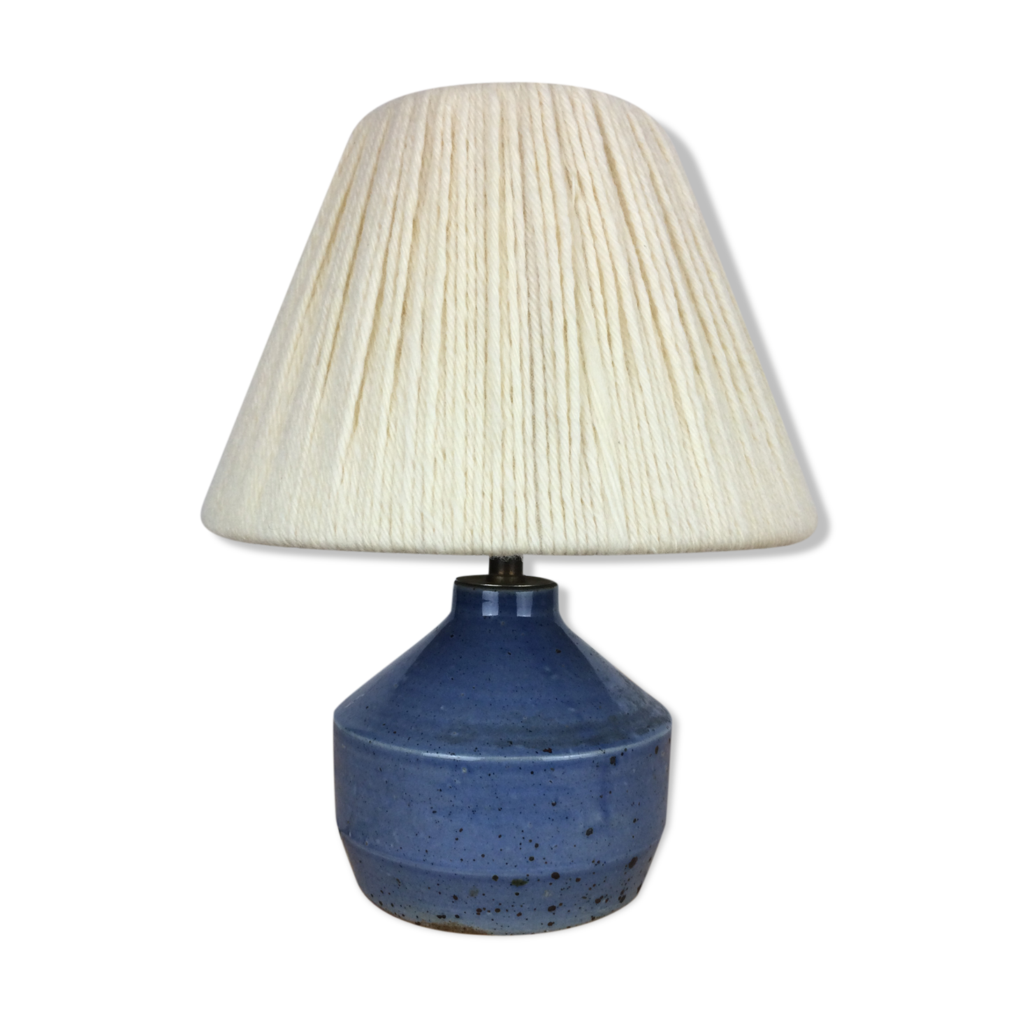 Blue ceramic lamp foot and white wool lampshade