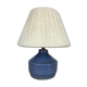Blue ceramic lamp foot and white wool lampshade
