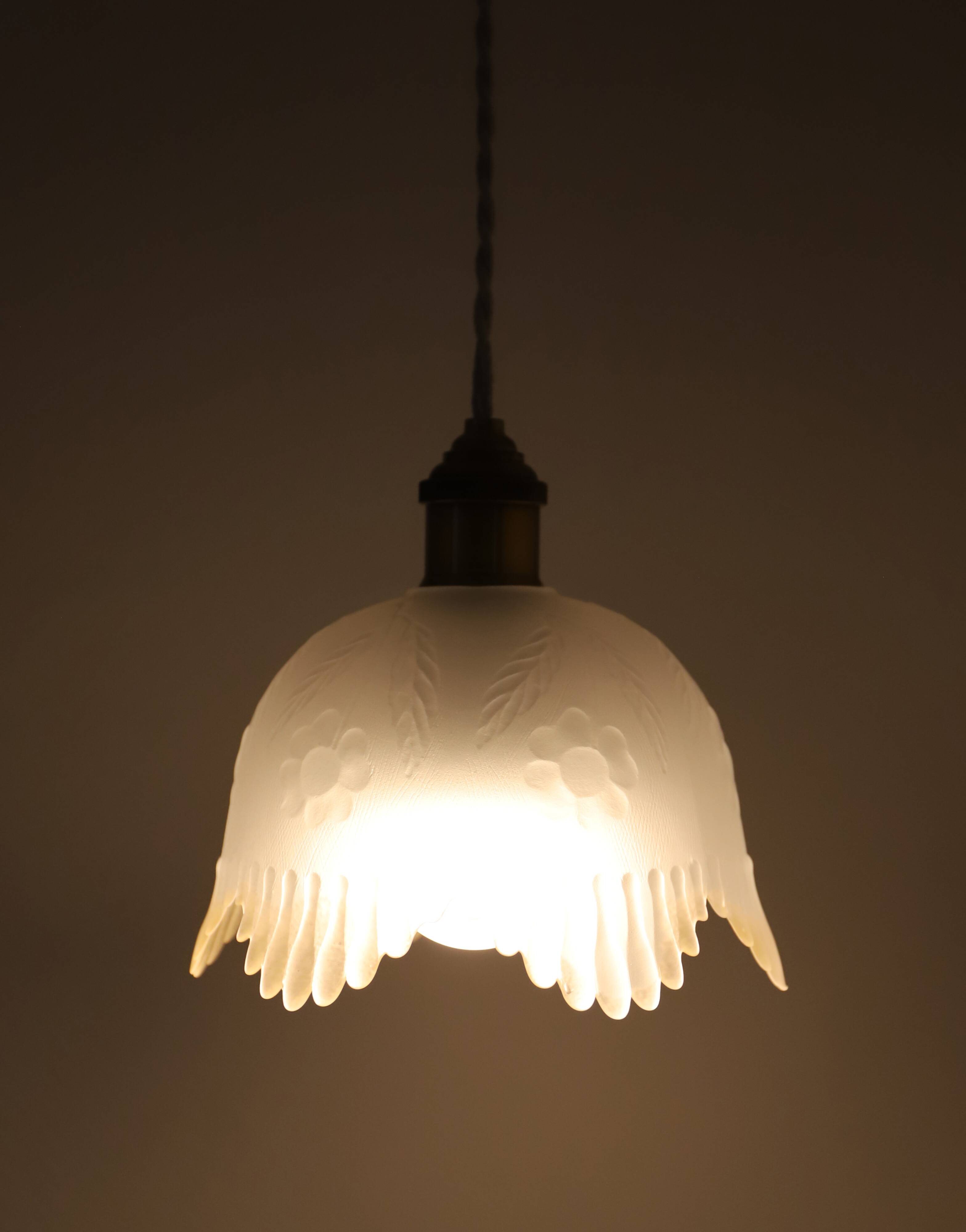 Frosted glass pendant light with floral pattern and wavy edge