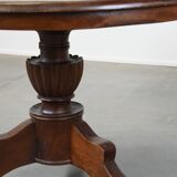 Wooden round 4-person dining table with detailed leg