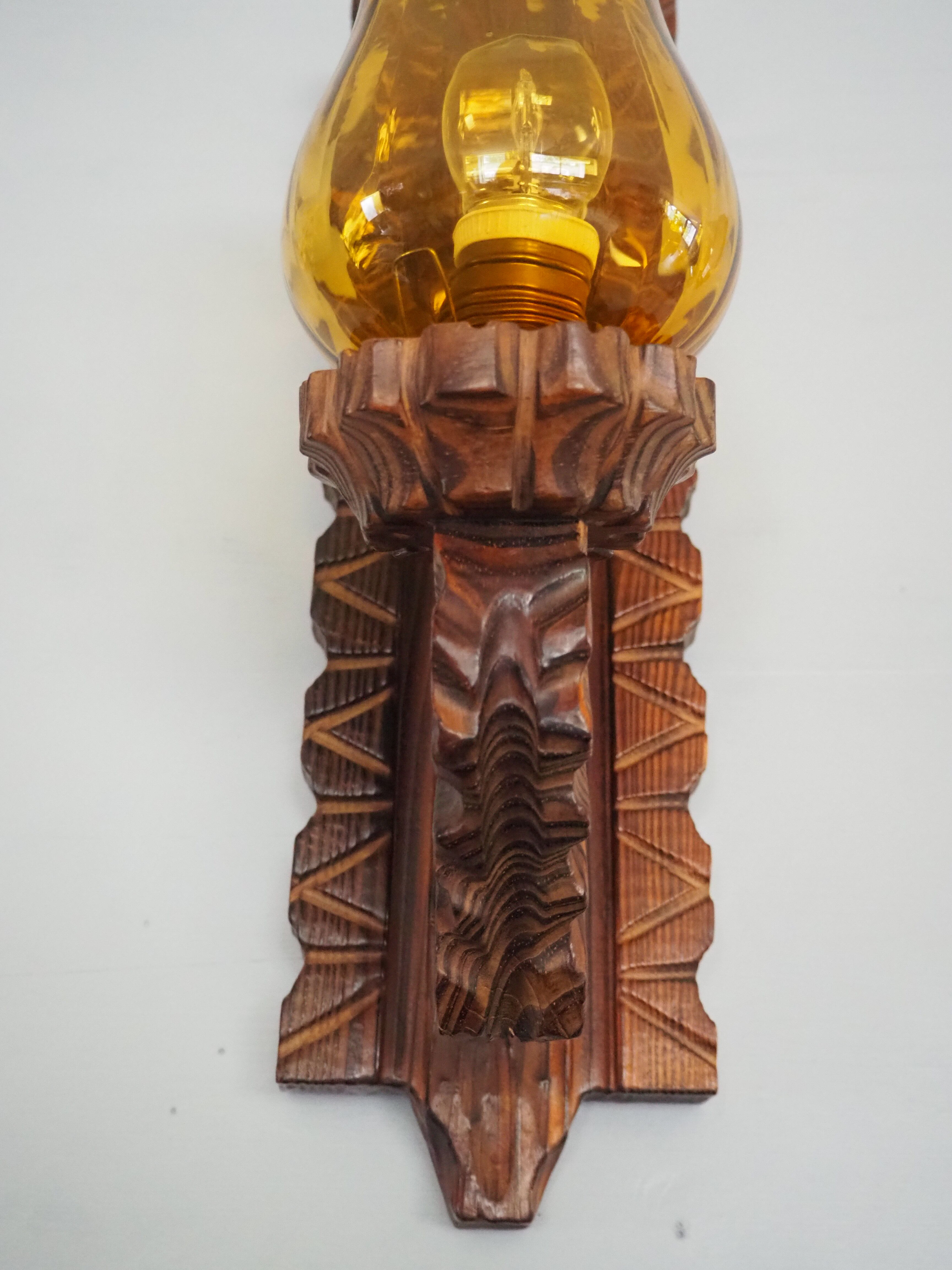 Wall sconce wooden and yellow glass tulip globe
