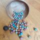 70 terracotta balls and a metal calot