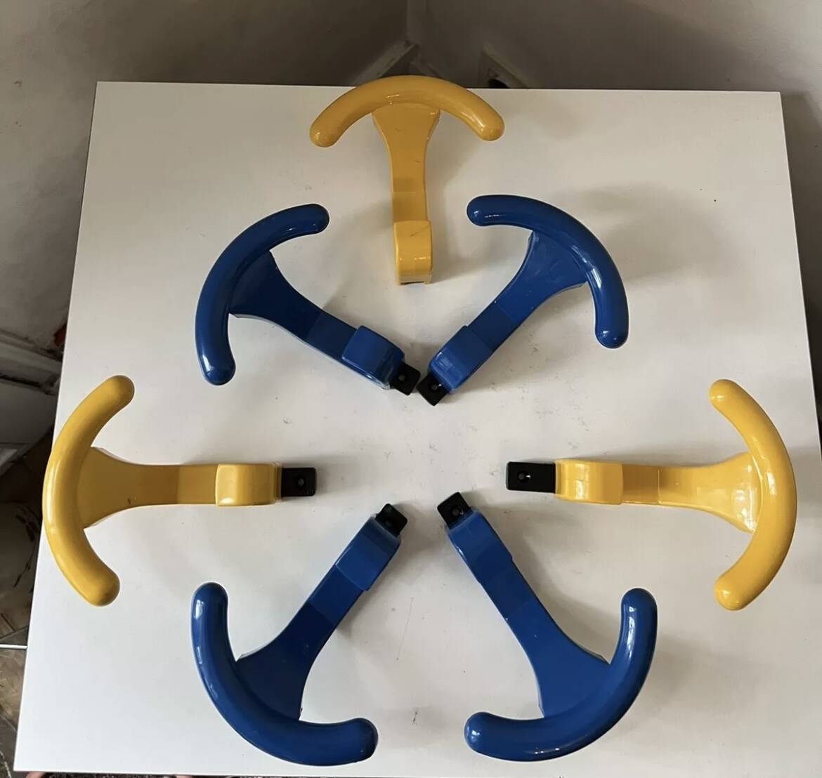 Vintage yellow blue plastic wall coat hooks Memphis 1980s