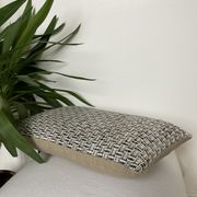 Bi-sided cushion beige black white pattern