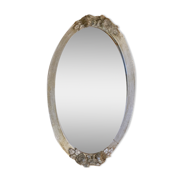 Very old mirror, flower motif frame