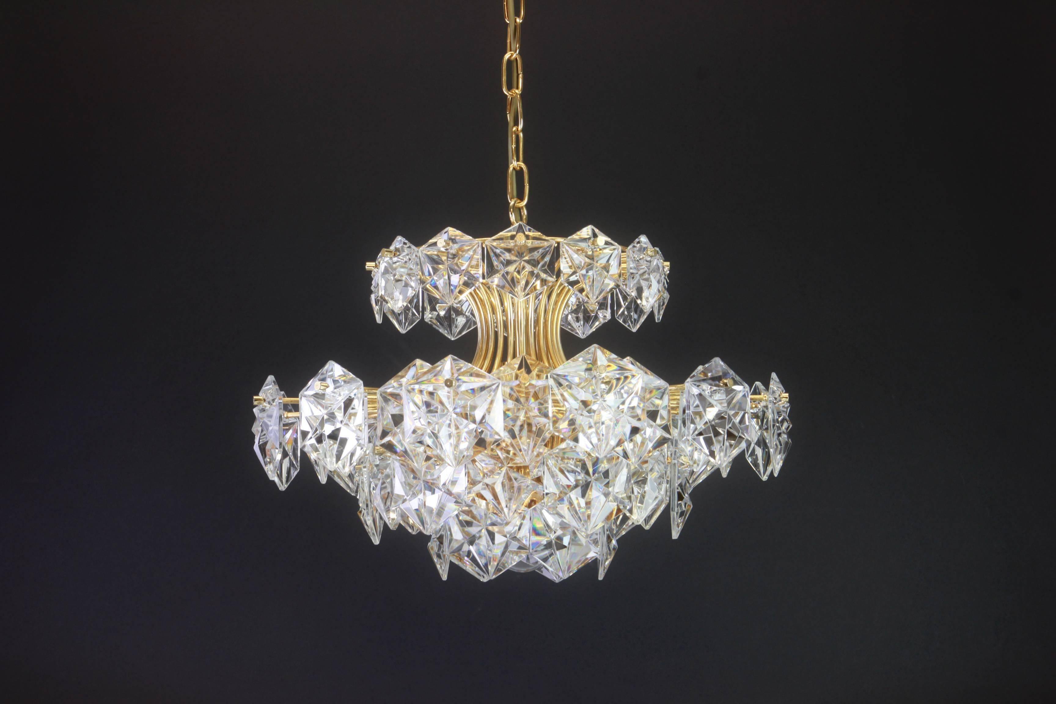 Chandelier in gilded brass and crystal glass by Kinkeldey, Germany, 1970s.