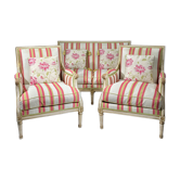 Louis XVI style lounge consisting of two armchairs and a 19th century sofa.