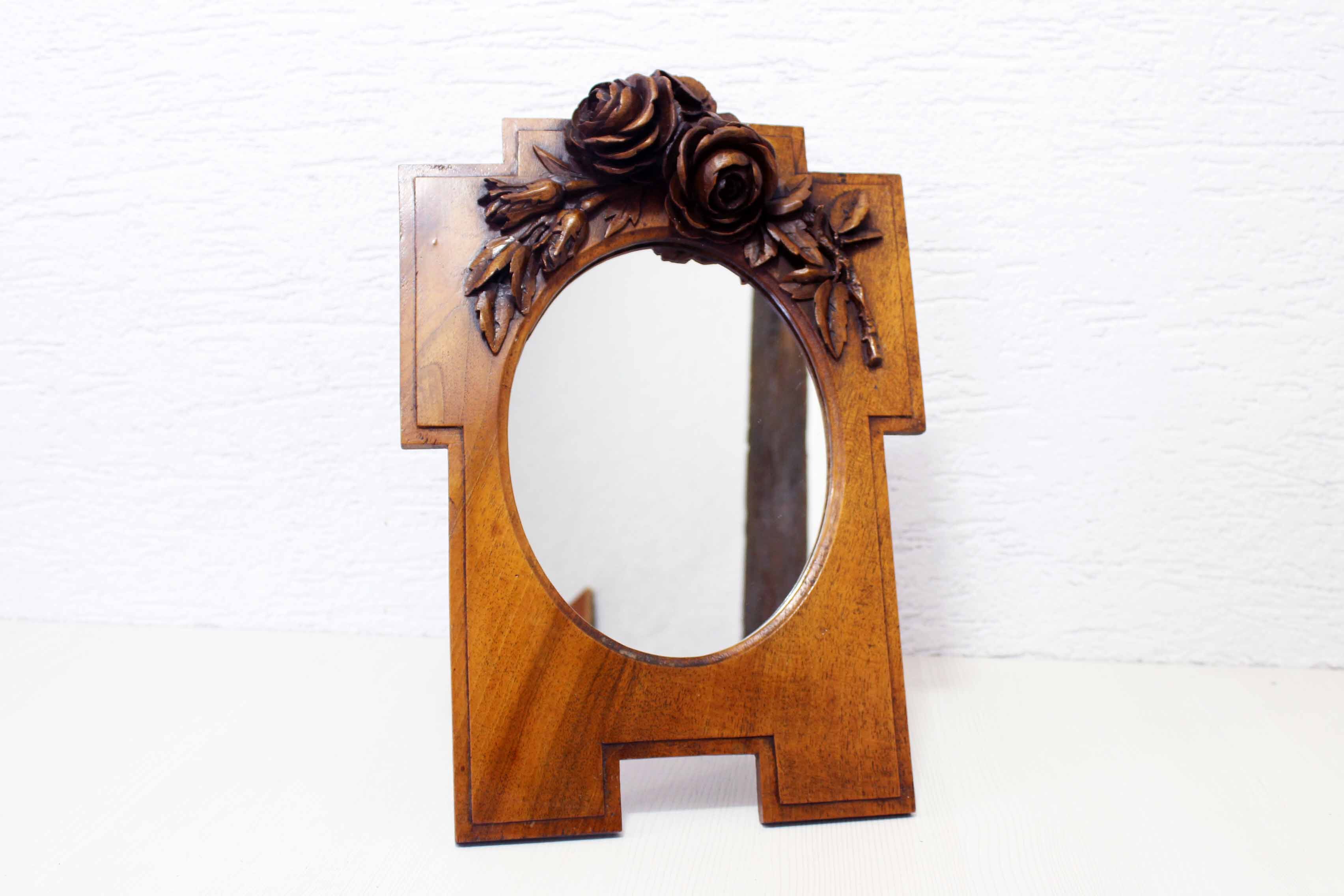Ancient carved walnut frame mirror