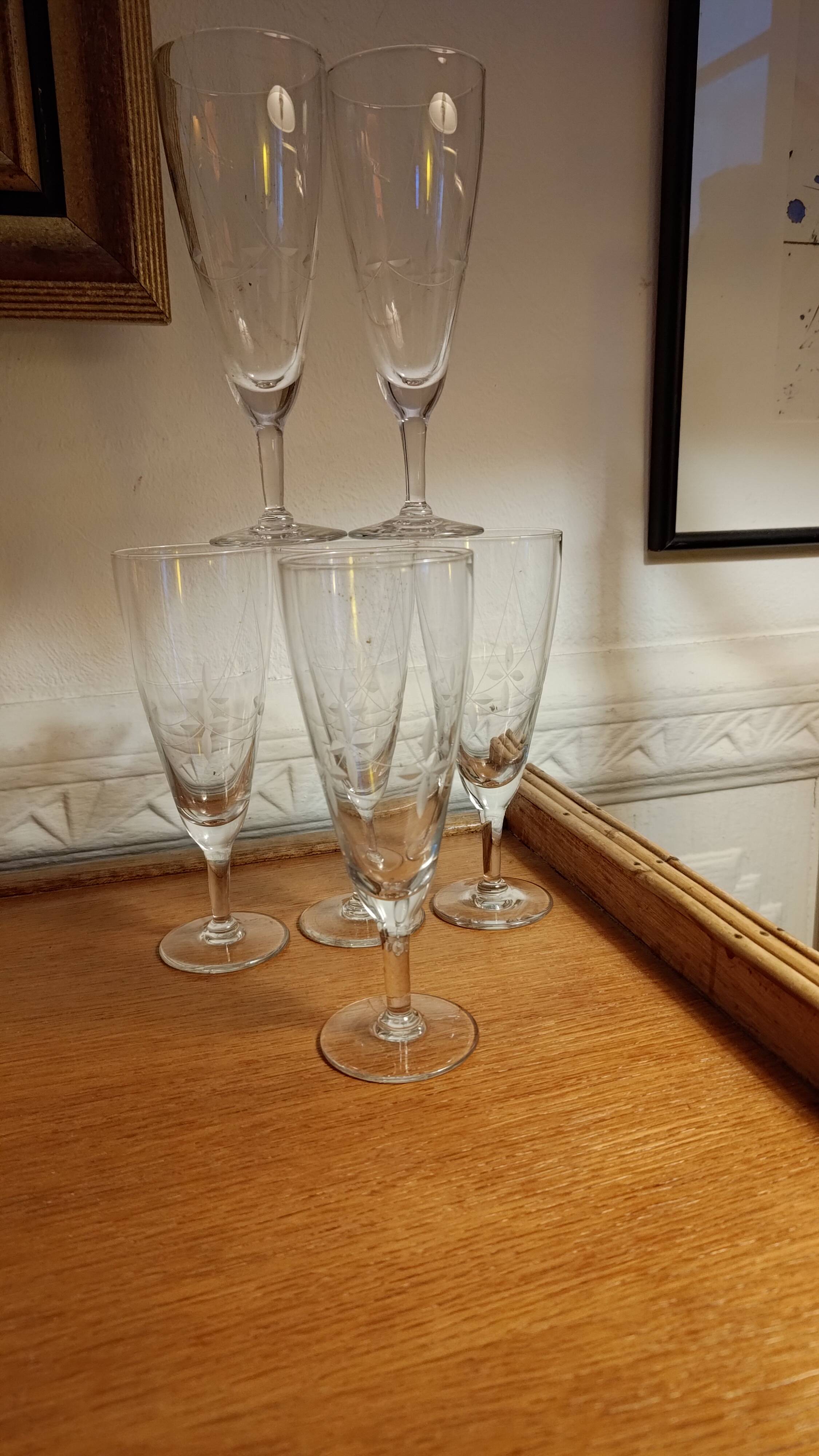 Six engraved crystal champagne flutes