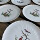 8 Bernardaud and Co. dessert plates signed Elbé, Limoges porcelain, decorated with birds