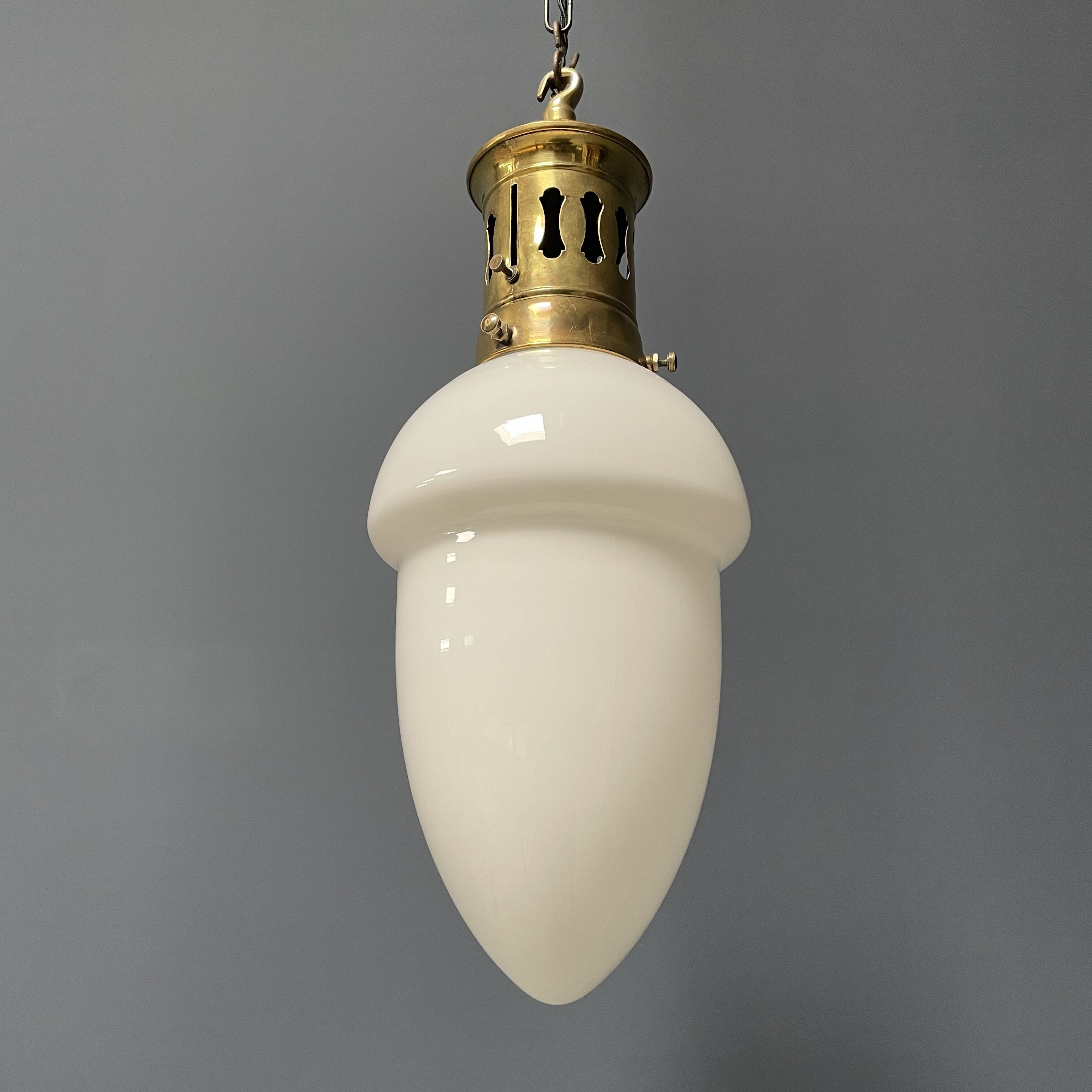 Opaline glass pendant lamp with elegant brass fixture