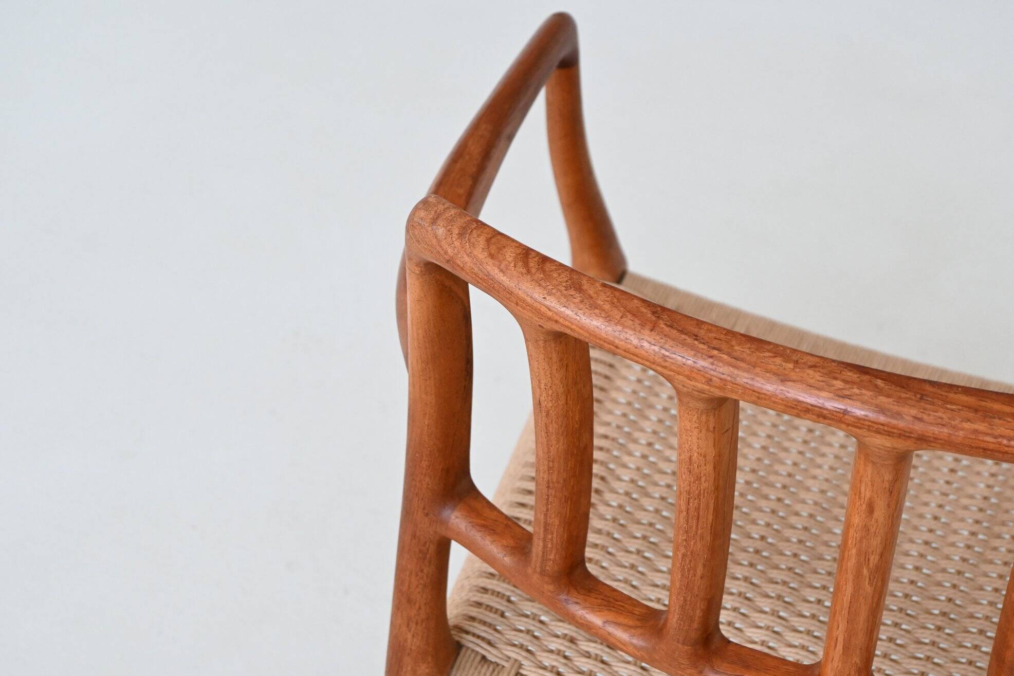 Niels Otto Moller model 66 armchairs teak and paper cord Denmark 1974