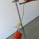 Three-spot floor lamp, Italian design, chrome and vintage orange.