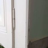 Pair of cupboard doors and old woodwork frame