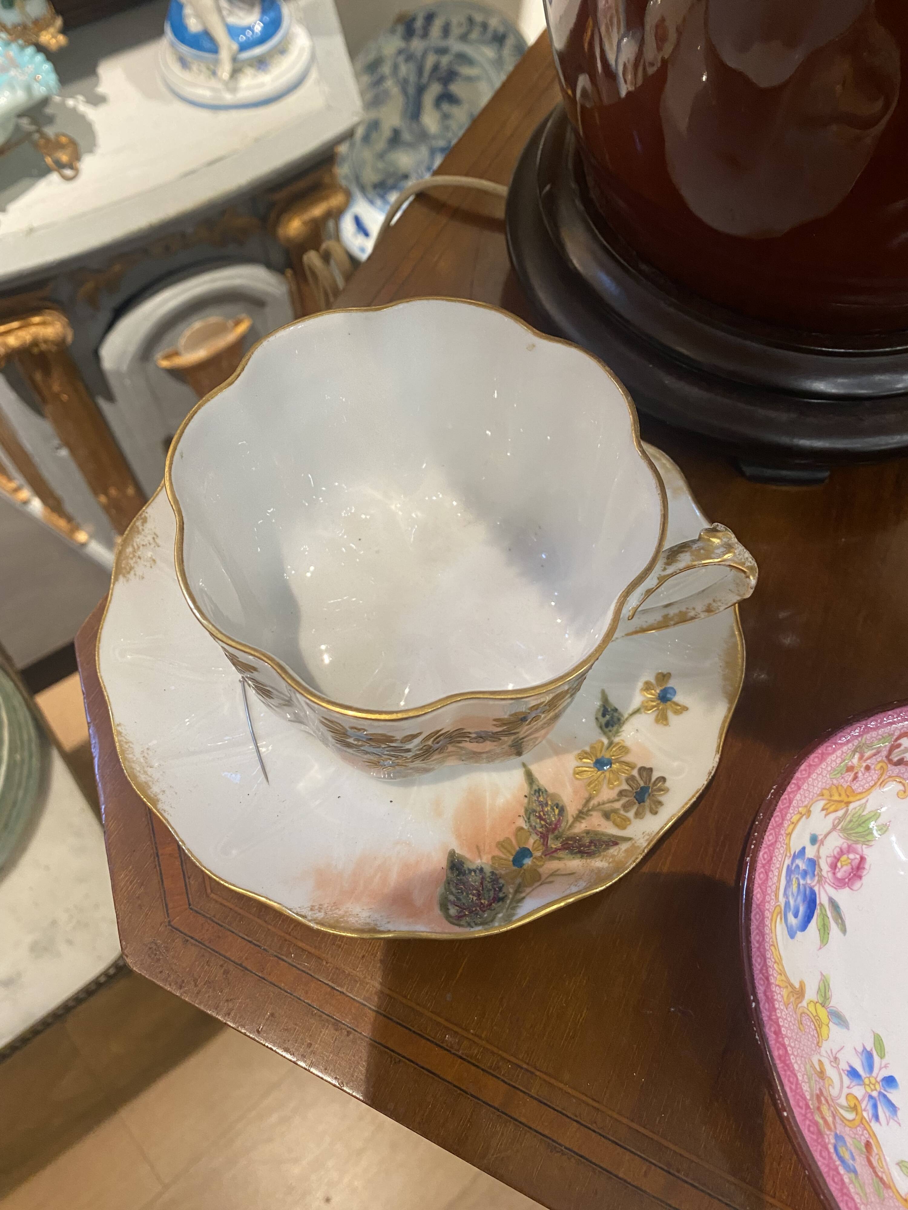 Enameled porcelain cup with saucer