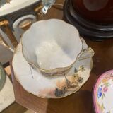 Enameled porcelain cup with saucer