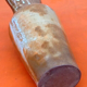 Glazed stoneware pitcher With white dripping on brown background Height: 270mm