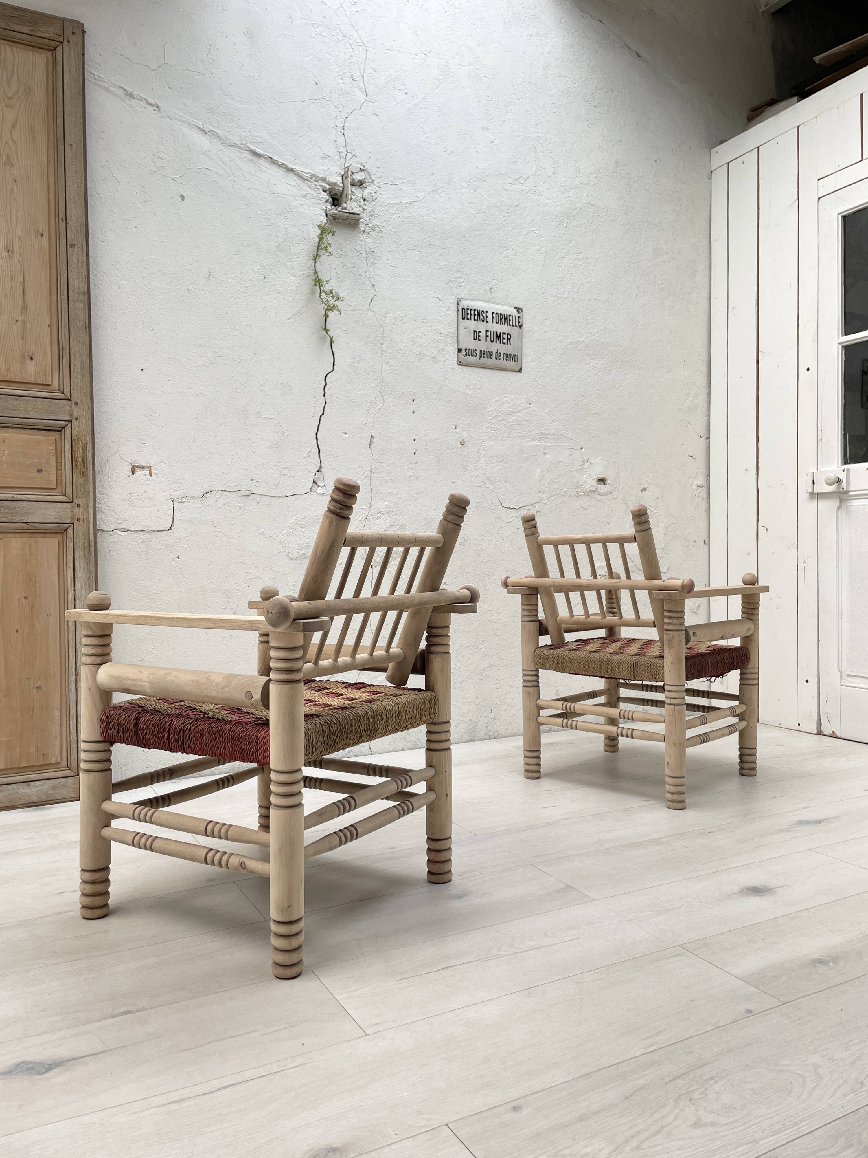 Pair of wooden armchairs and ropes