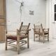 Pair of wooden armchairs and ropes