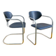 Pair of Effezeta chairs, tubular structure, chrome and black skai