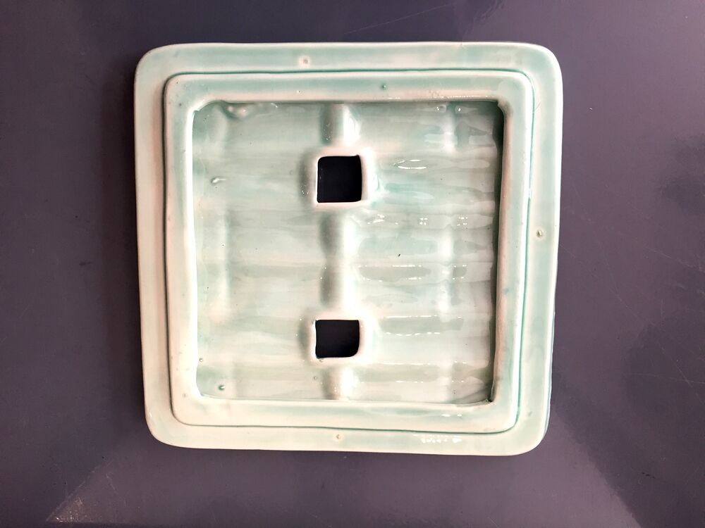 Asparagus dish with drainer in water green tones